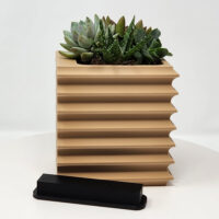 3D printed wall mountable planter.